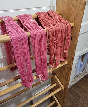 Yarns drying on rack