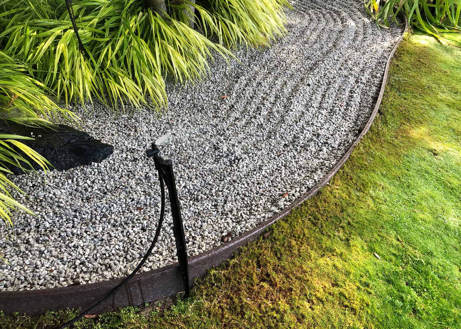 Pressure compensating shrubbler watering Japanese Garden at the Discovery Garden on Hwy 536 West of Mount Vernon