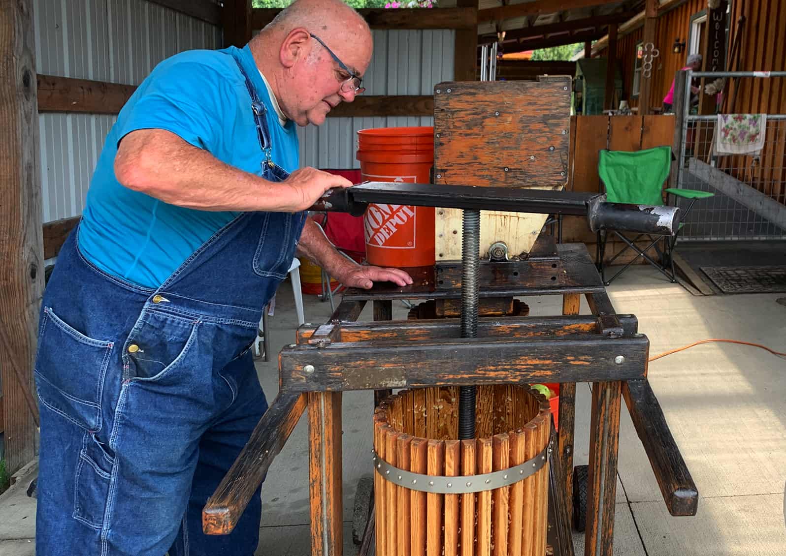 Master Gardener Toby Richner has been making sweet cider for more than 40 years. Beyond enjoying great cider year around, he enjoys the community they've built trading apples for fresh pressed cider. © Ginny Bode