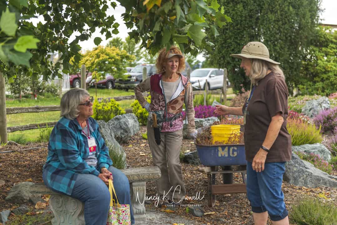 Gardening provides the camaraderie of sharing a goal working with our children, family, or gardening friends. © Nancy Crowell Photography