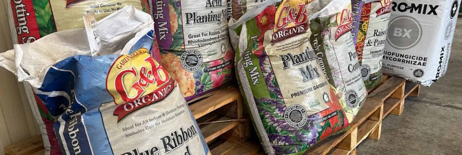 Bags of potting soil on store pallets