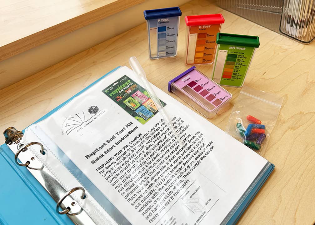 Book and vials for soil testing