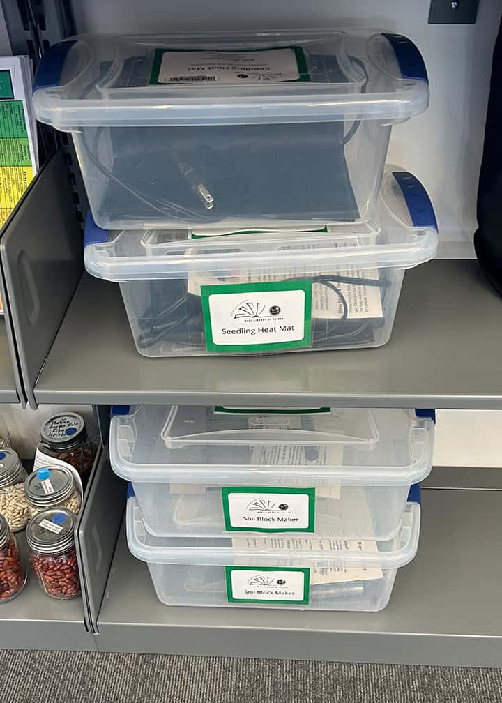 kits in plastic boxes on shelf