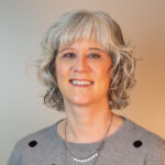 picture of woman in grey top