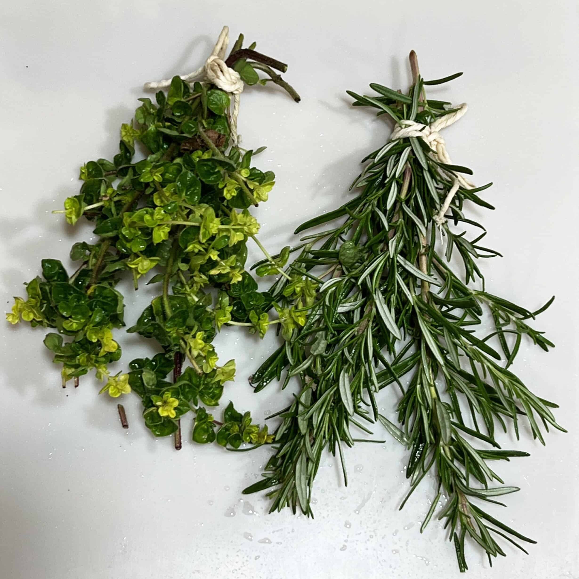 Bunches of herbs ready for hang drying. © Photographer: Laura Kuhn