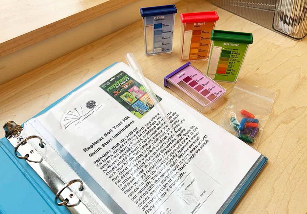 Book and vials for soil testing