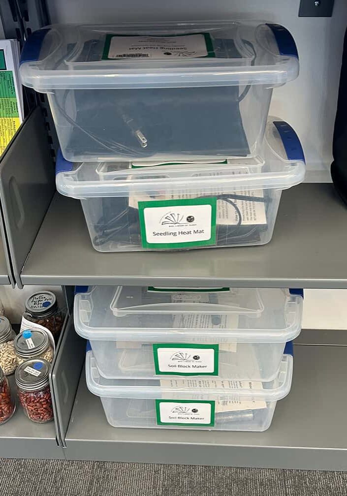 kits in plastic boxes on shelf