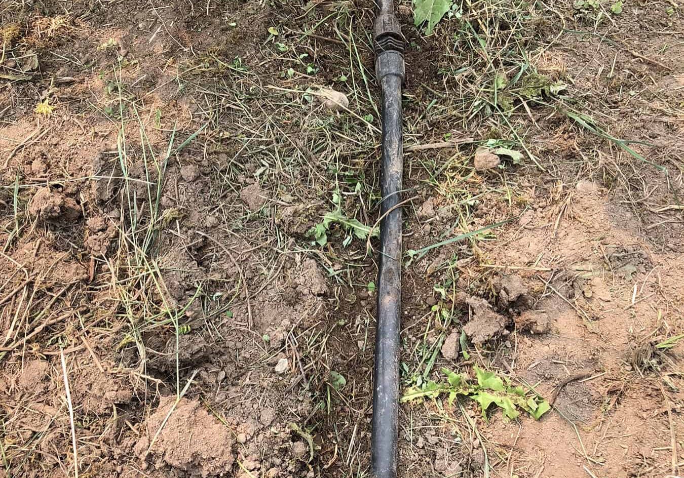 Blog1_2286 A 1/2” mainline with multiple repairs illustrating the result of burying drip lines under mulch. Such hidden lines are invariably severed by weeding activity. © Bob Bryan