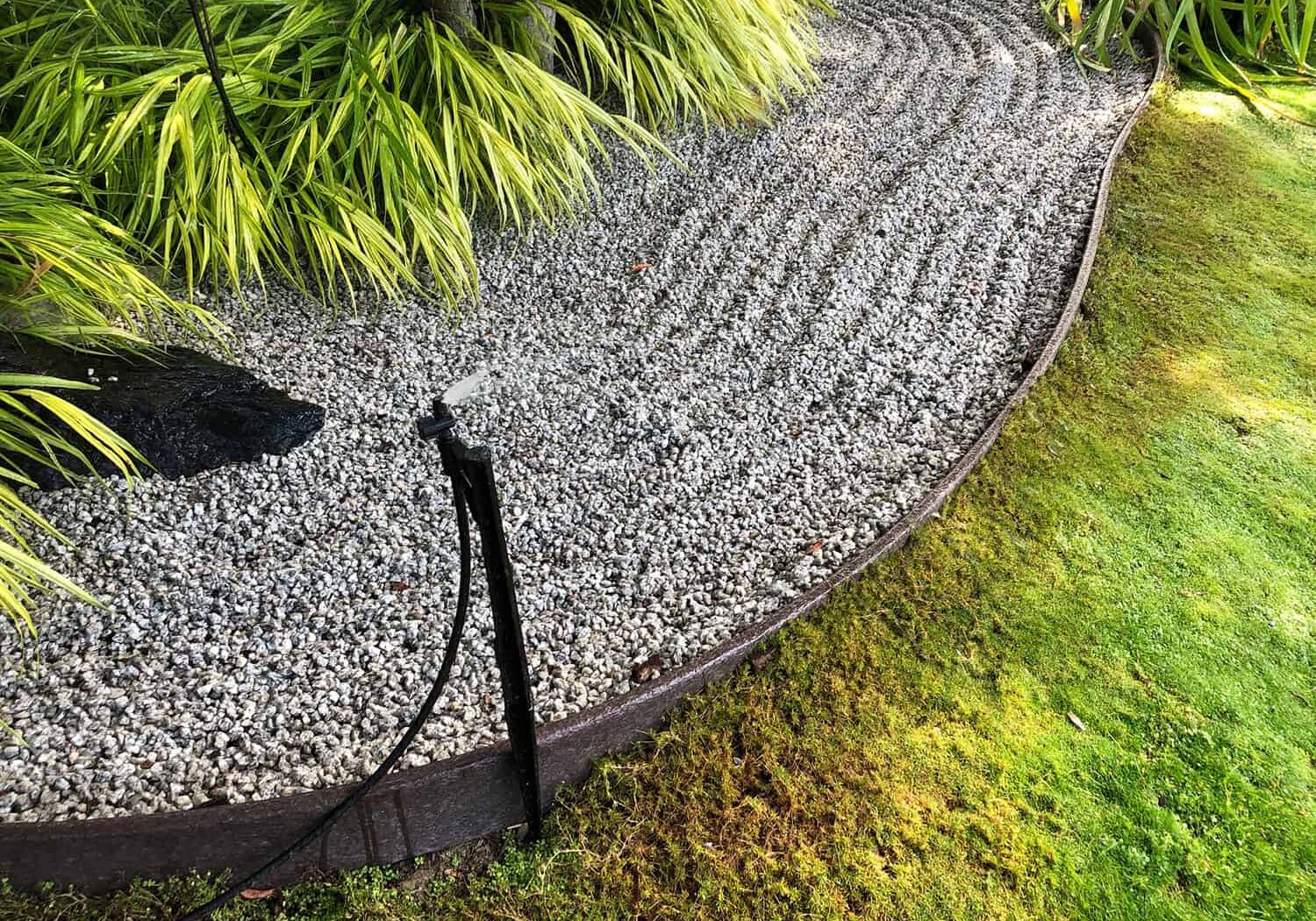 Blog_071623_2 Pressure compensating shrubbler watering Japanese Garden at the Discovery Garden on Hwy 536 West of Mount Vernon